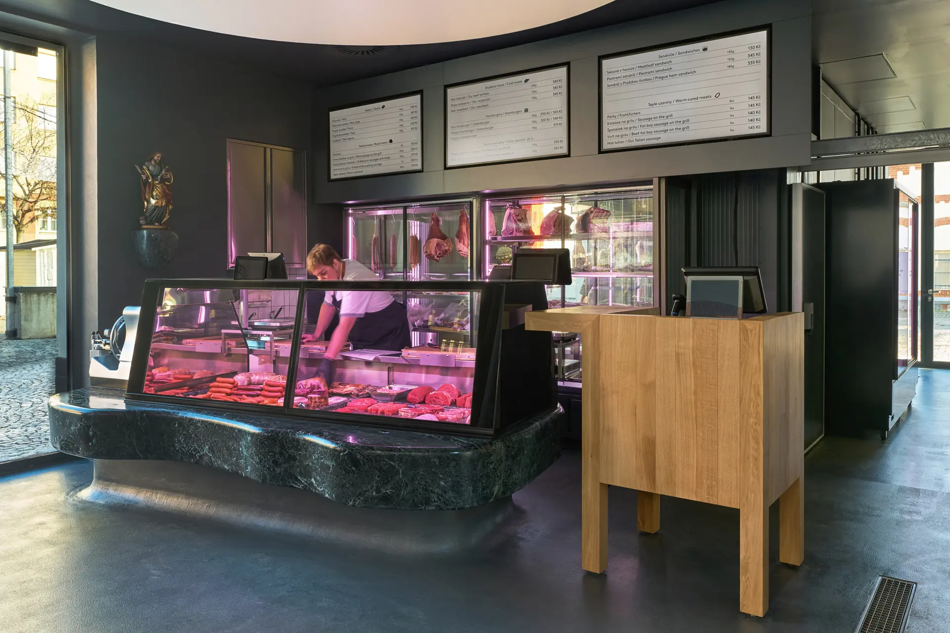Butcher counter at Naše maso in Holešovice Market.